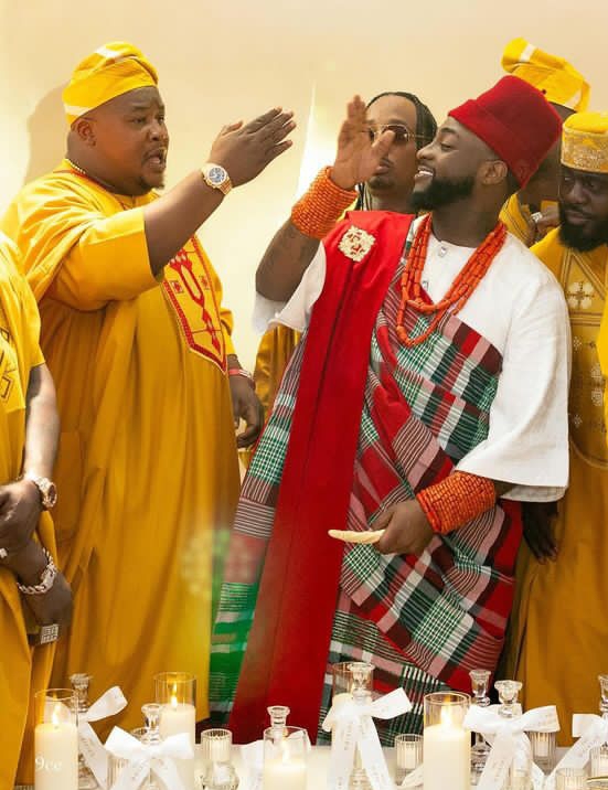 Cubana Chief priest in a regal yellow agbada 