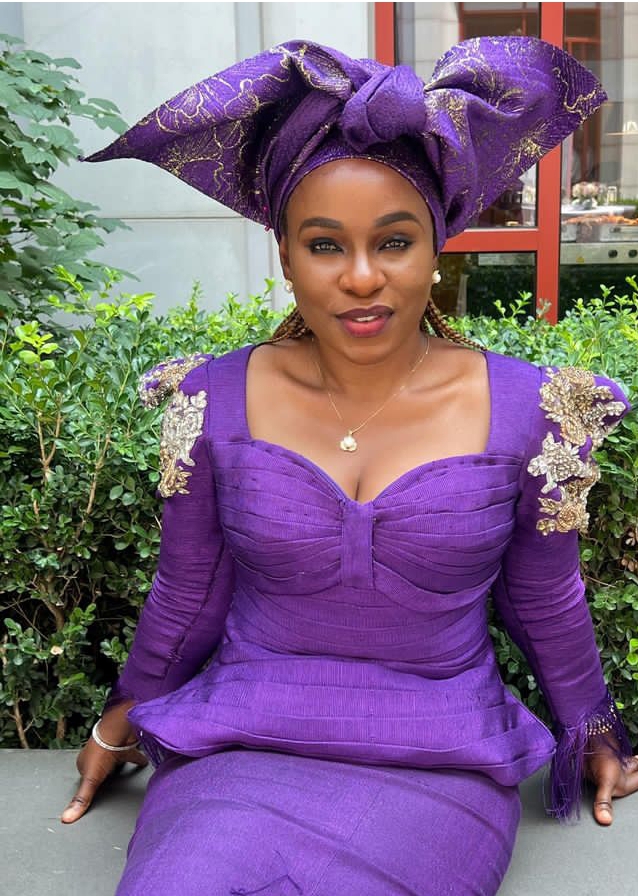 Bolanle Austen-Peters in a native purple attire 