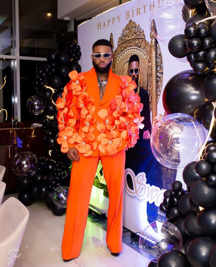 An image of Swanky Jerry slaying orange suit to perfection 