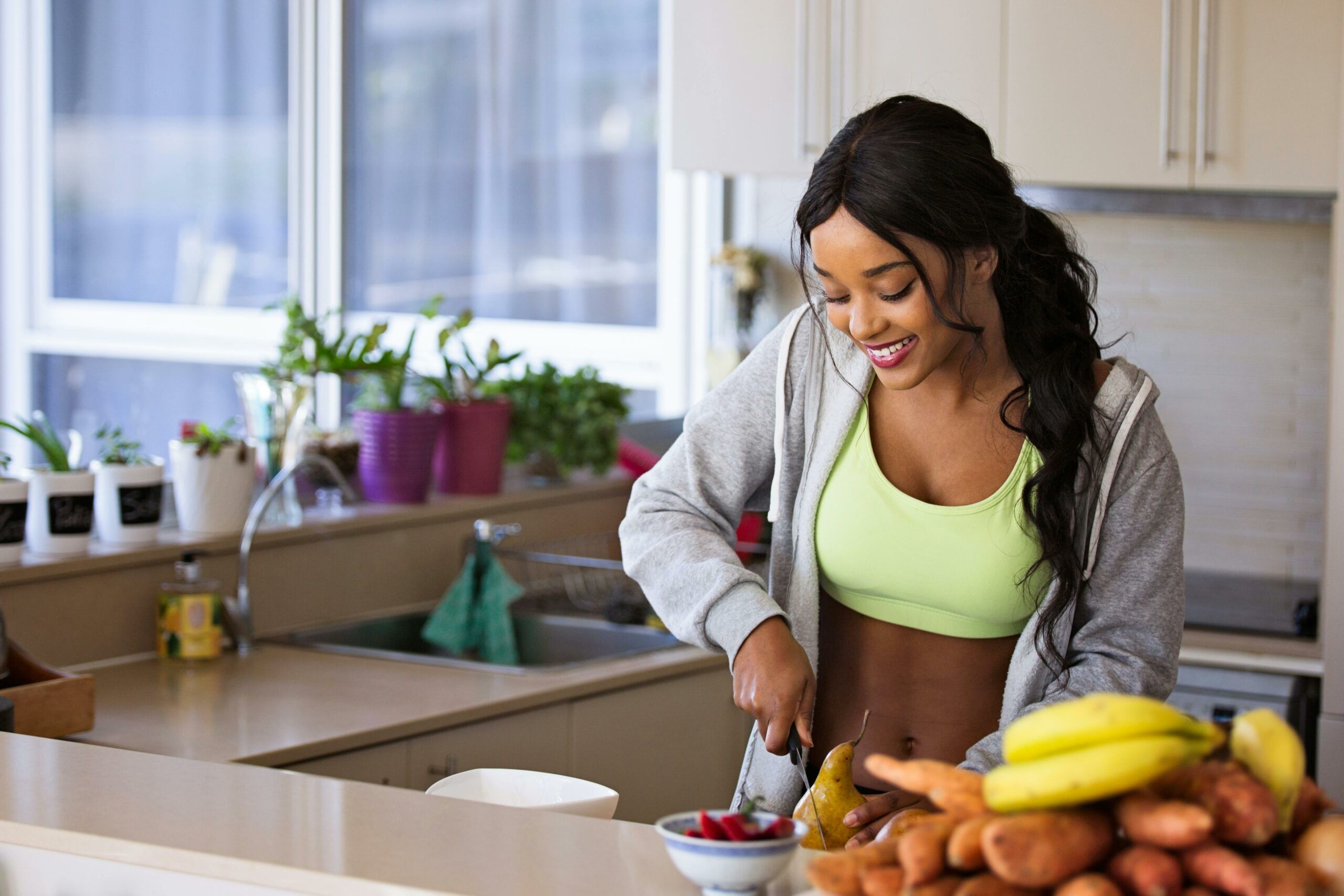 Healthy meal preparation for healthy living by a young woman