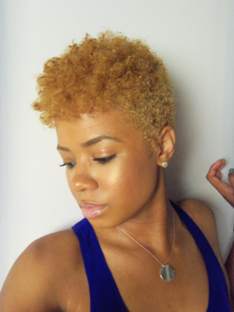 Honey blonde low cut hair style 