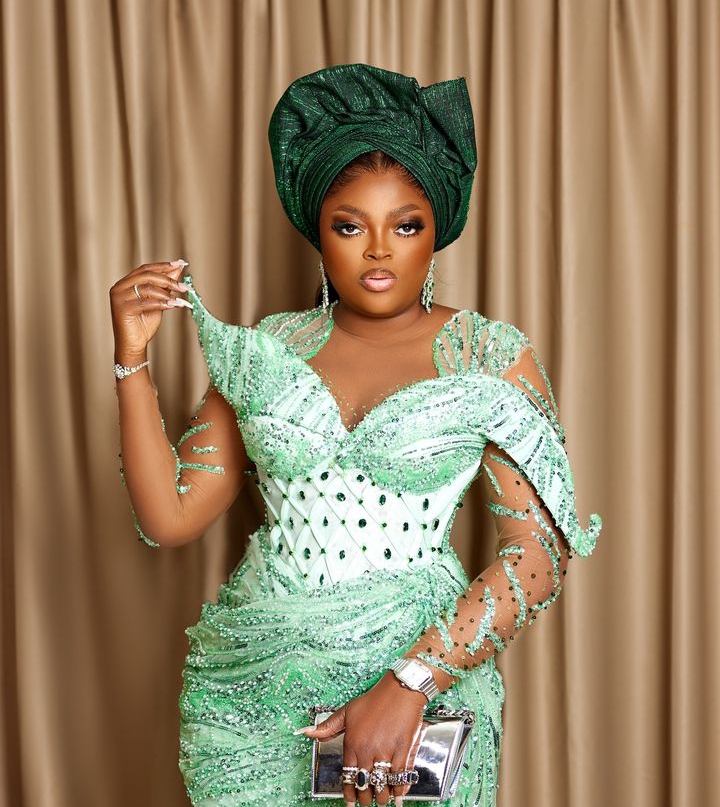 Funke Akindele in a sea Green Asoebi look