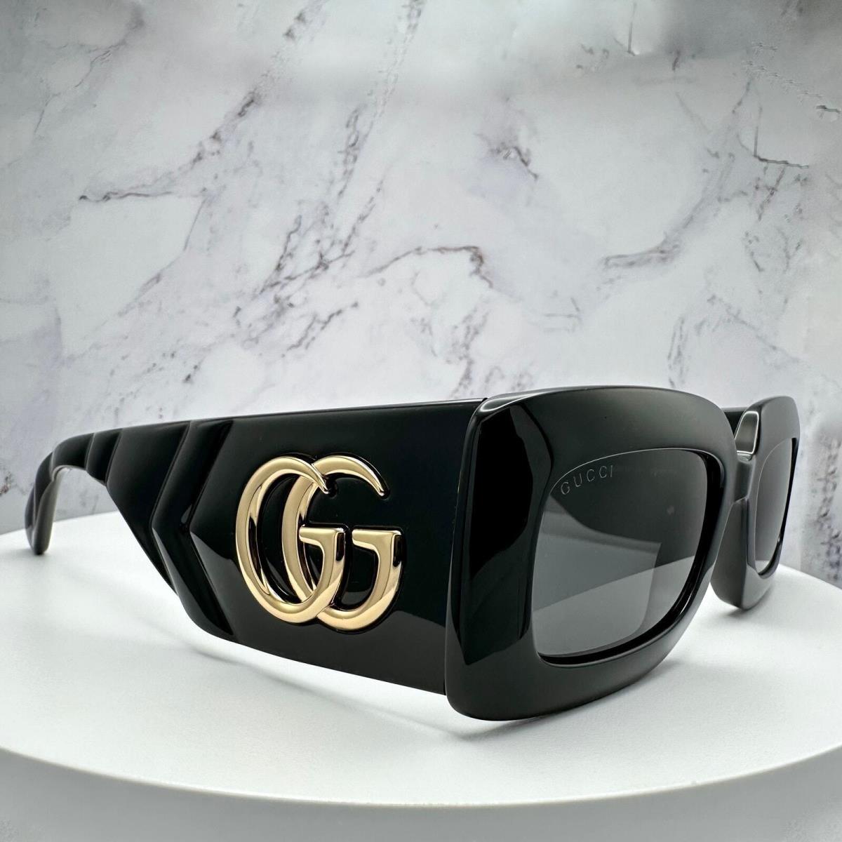 A black Gucci Sunshade