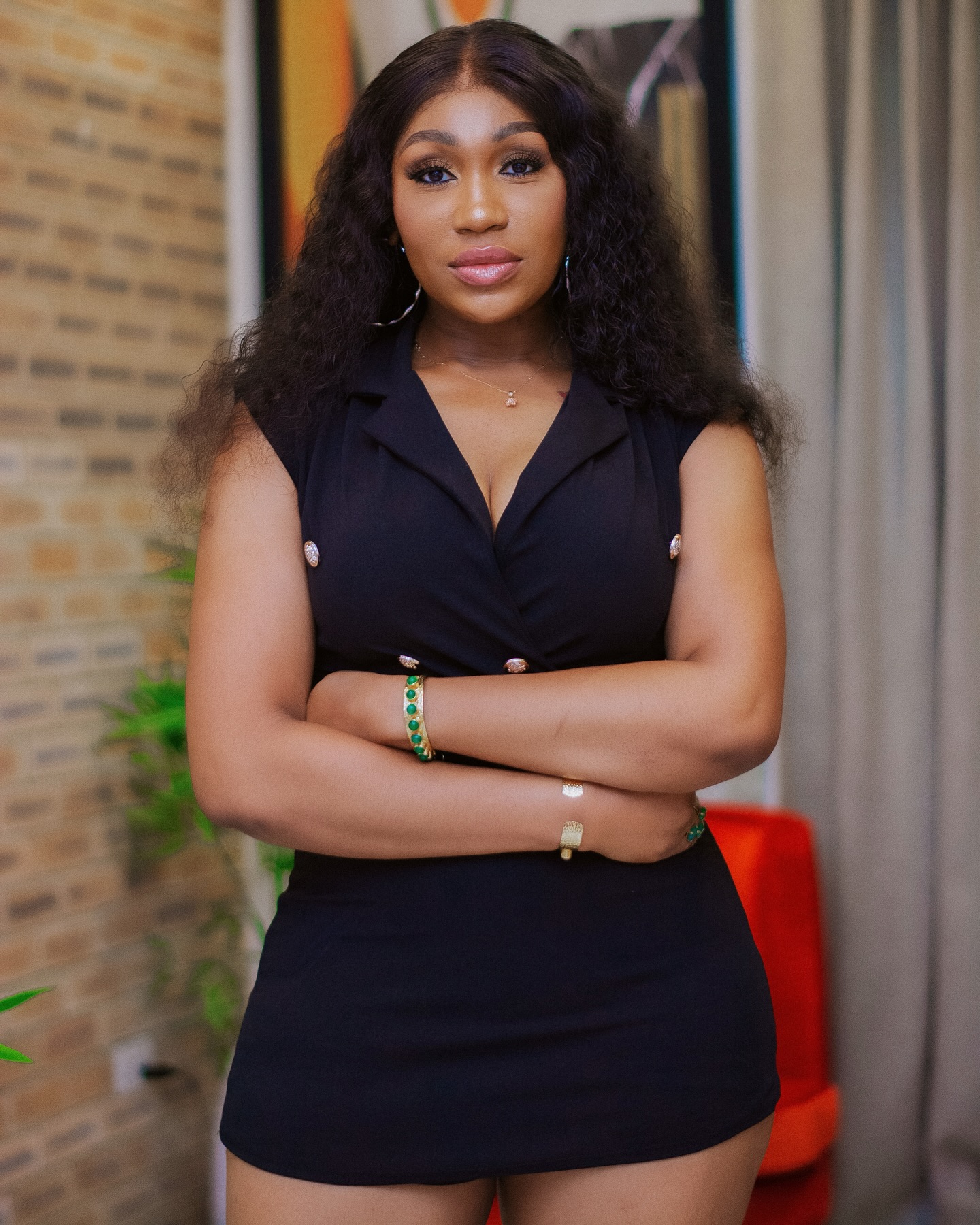 Ebube Nwagbo in an official black mini dress