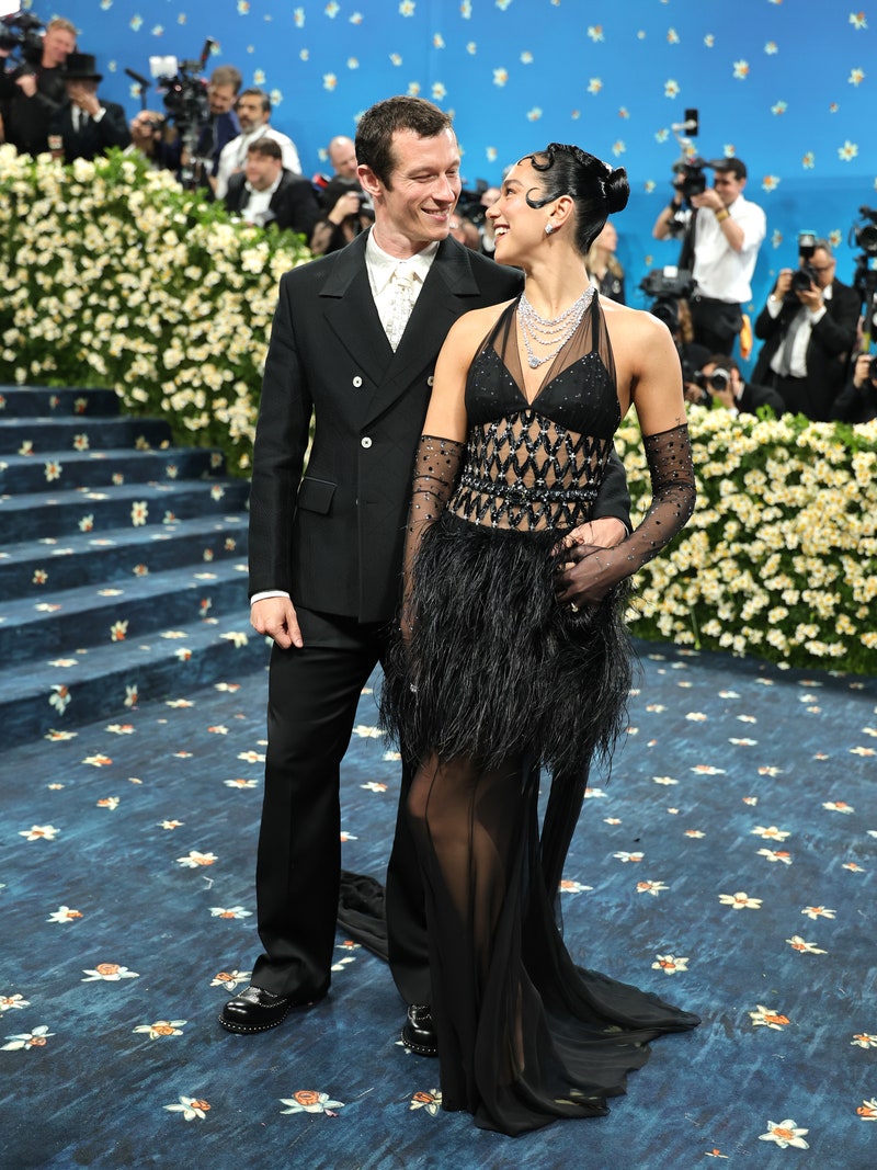 Celebrity Couple Names\] posing together on the 2025 Met Gala red carpet.
