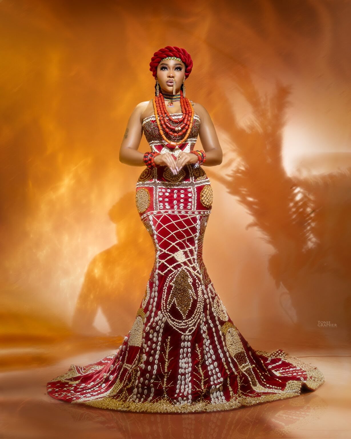 A Nigerian celebrity poses in a stunning traditional outfit at the AMVCA 2025