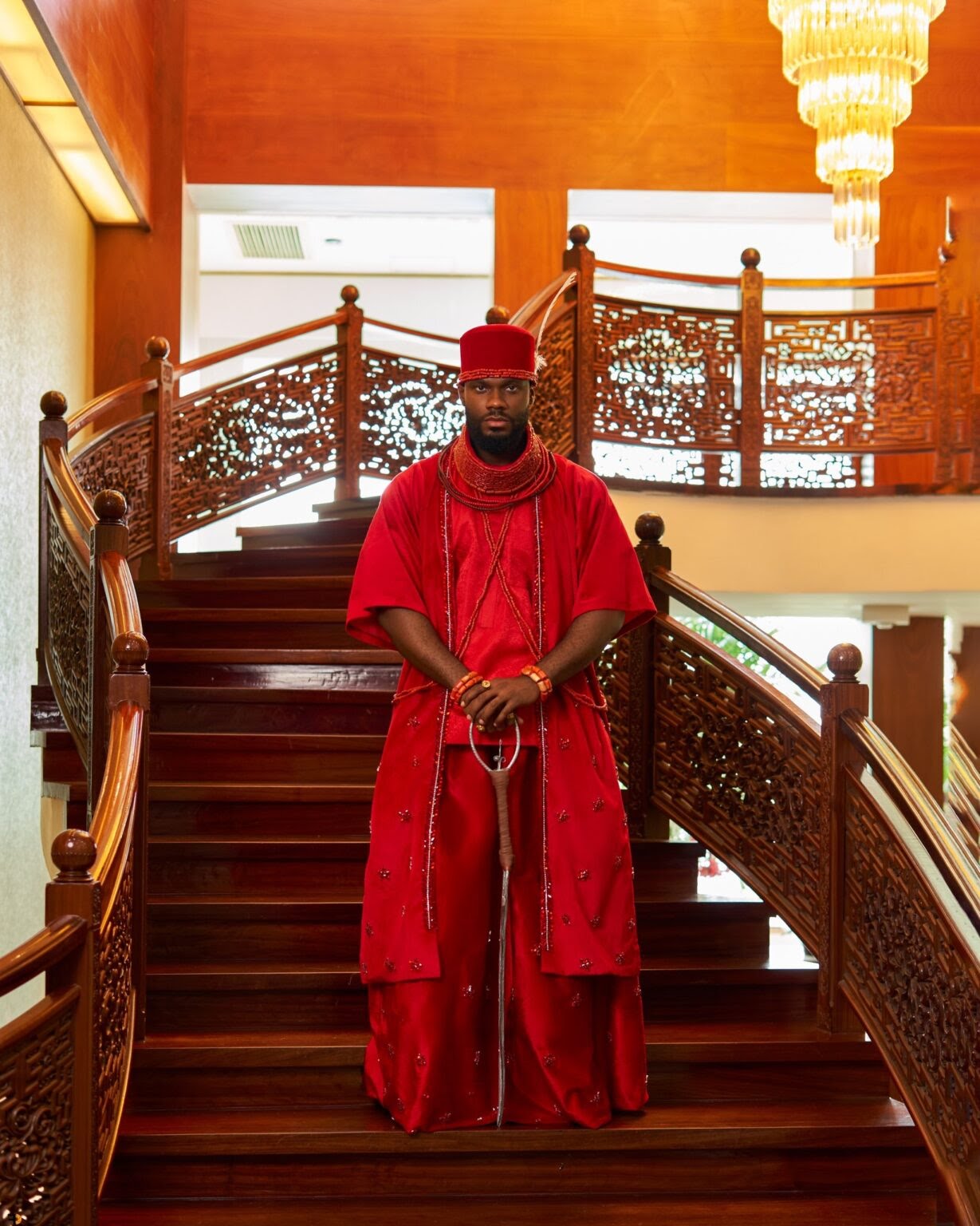 A Nigerian celebrity poses in a stunning traditional outfit at the AMVCA 2025