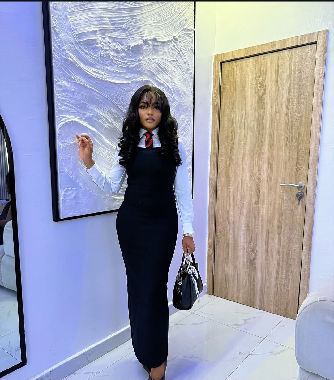 "A stylish Nigerian woman wearing fashionable and professional workwear