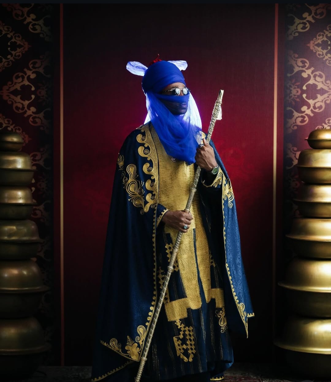 A Nigerian celebrity poses in a stunning traditional outfit at the AMVCA 2025