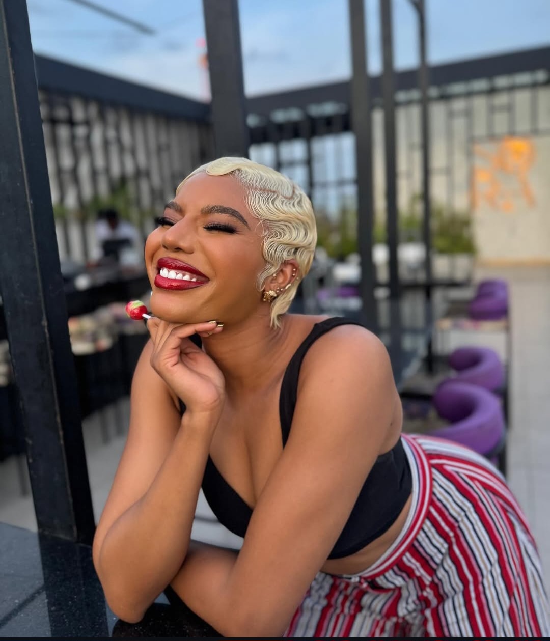Nancy Isime wearing her signature red lipstick
