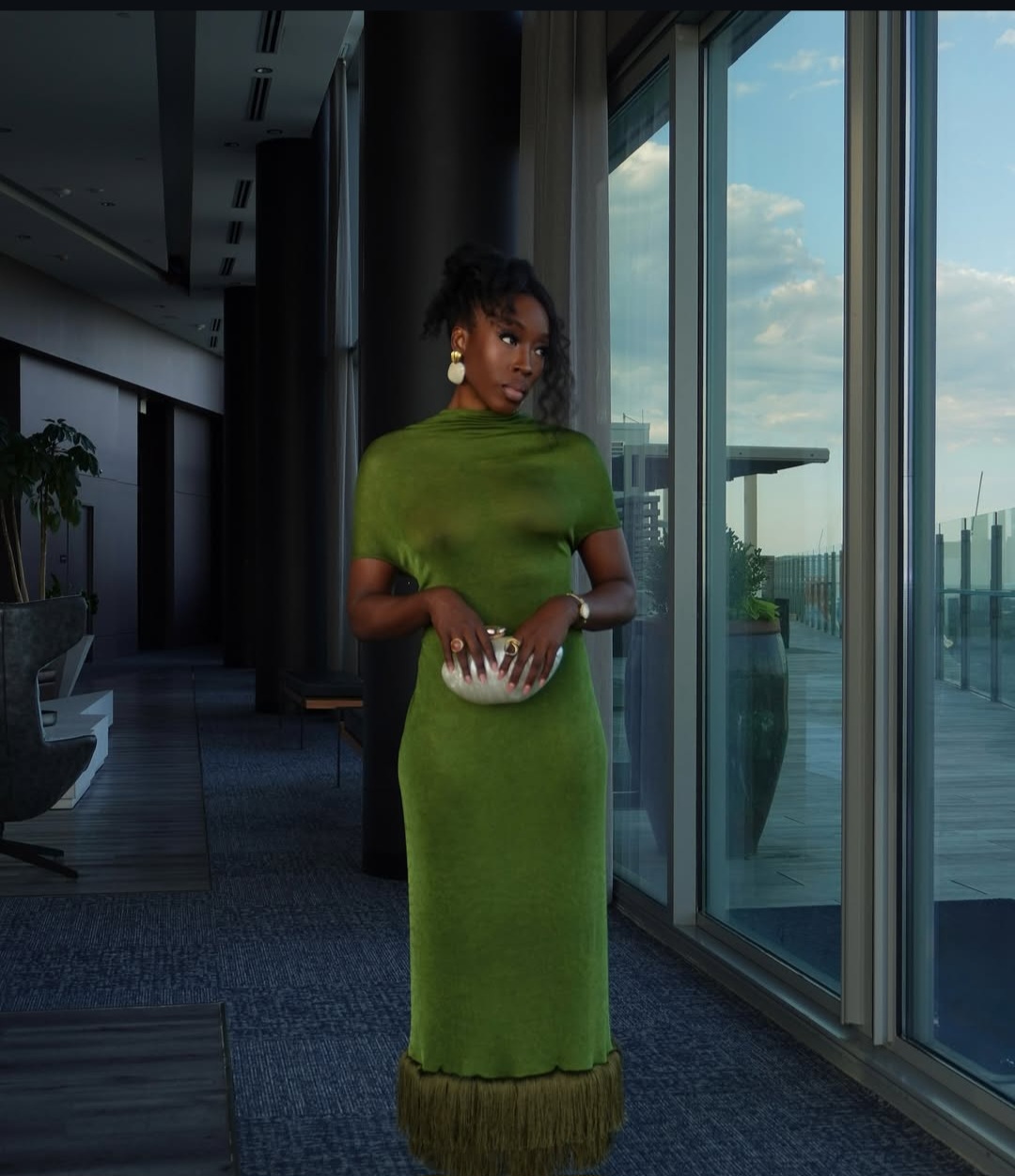 stylish Nigerian fashionista posing in a standout outfit