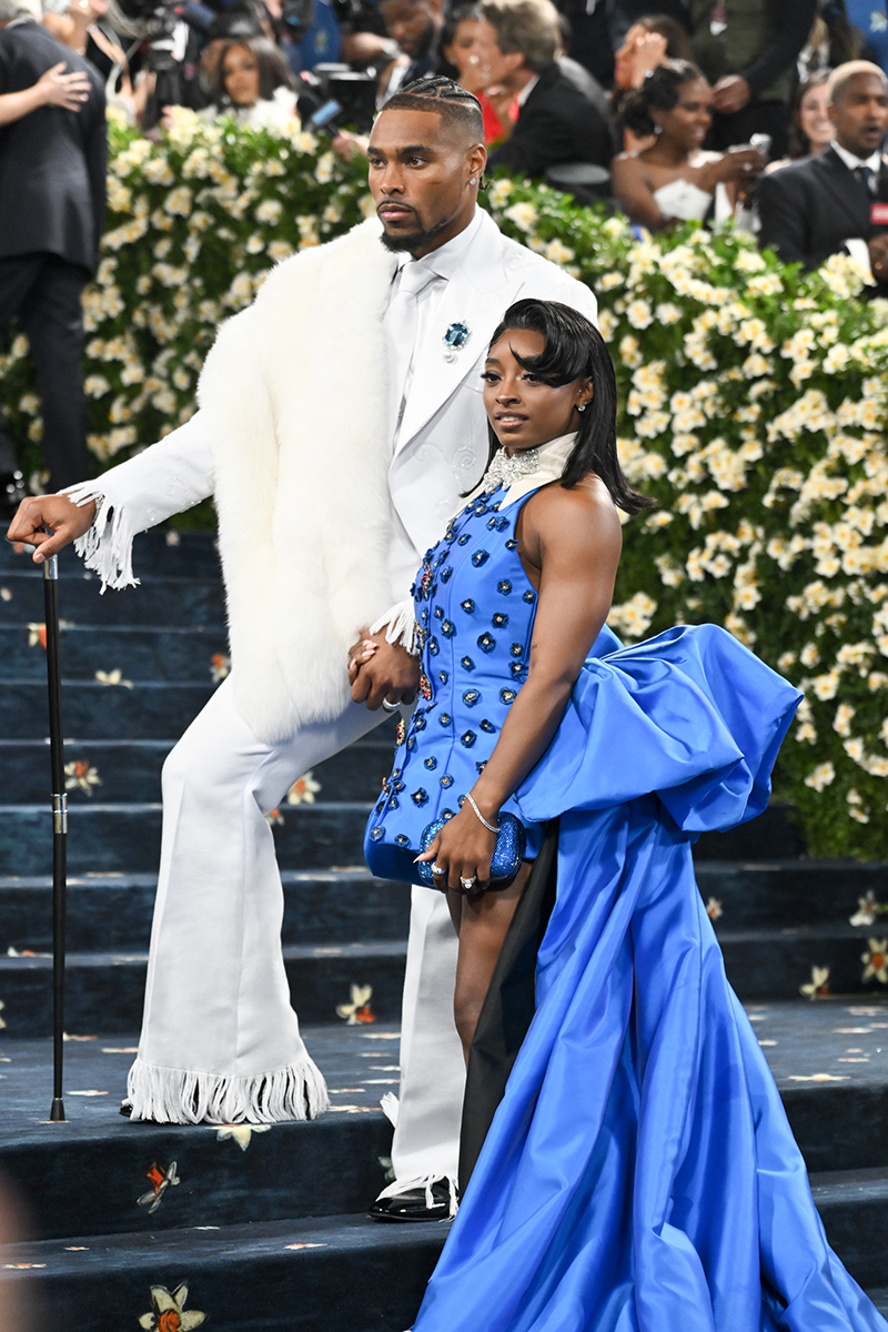Celebrity Couple Names\] posing together on the 2025 Met Gala red carpet.