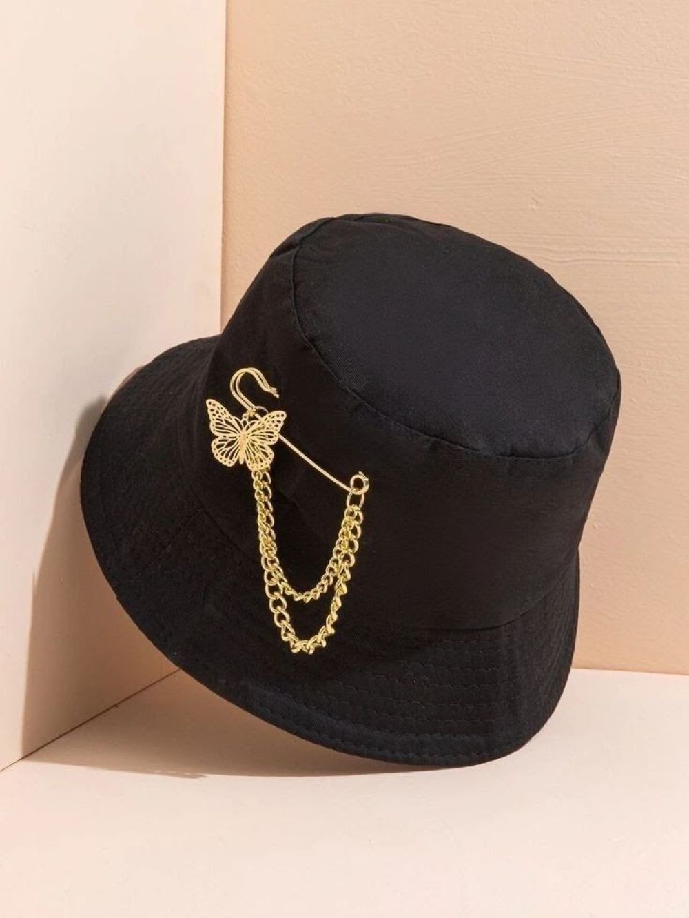 brooch on hat