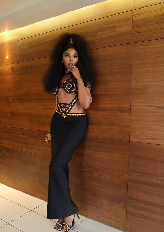 Nancy Isime in a black red carpet worthy outfit
