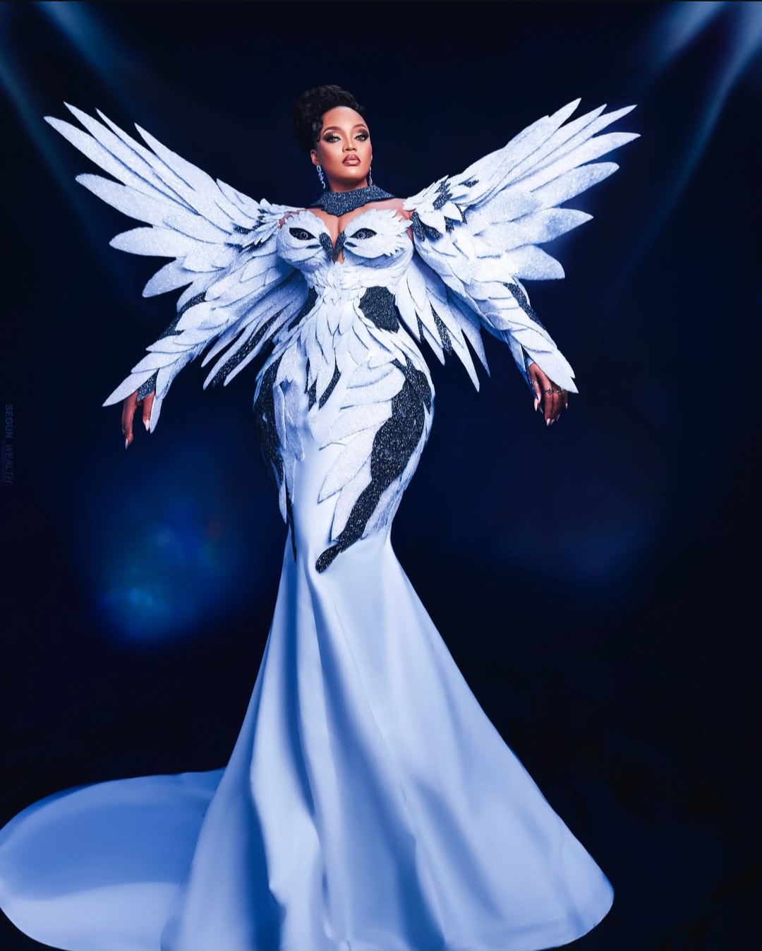 white eagle-inspired dress designed by Tiannah’s Place Empire for influencer Kentazz1
