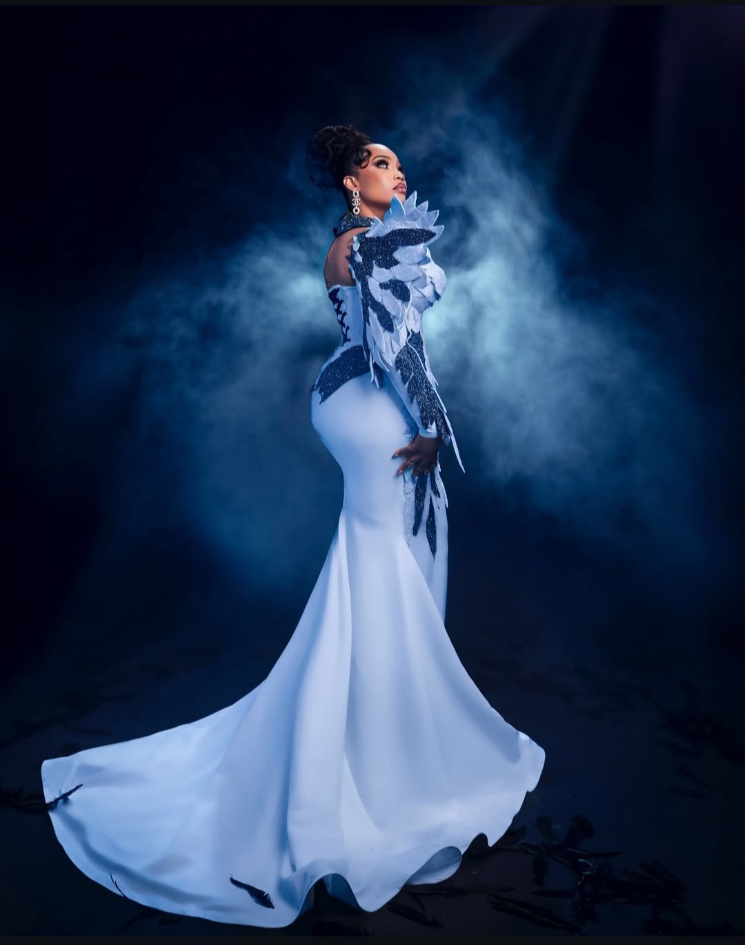 white eagle-inspired dress designed by Tiannah’s Place Empire for influencer Kentazz1