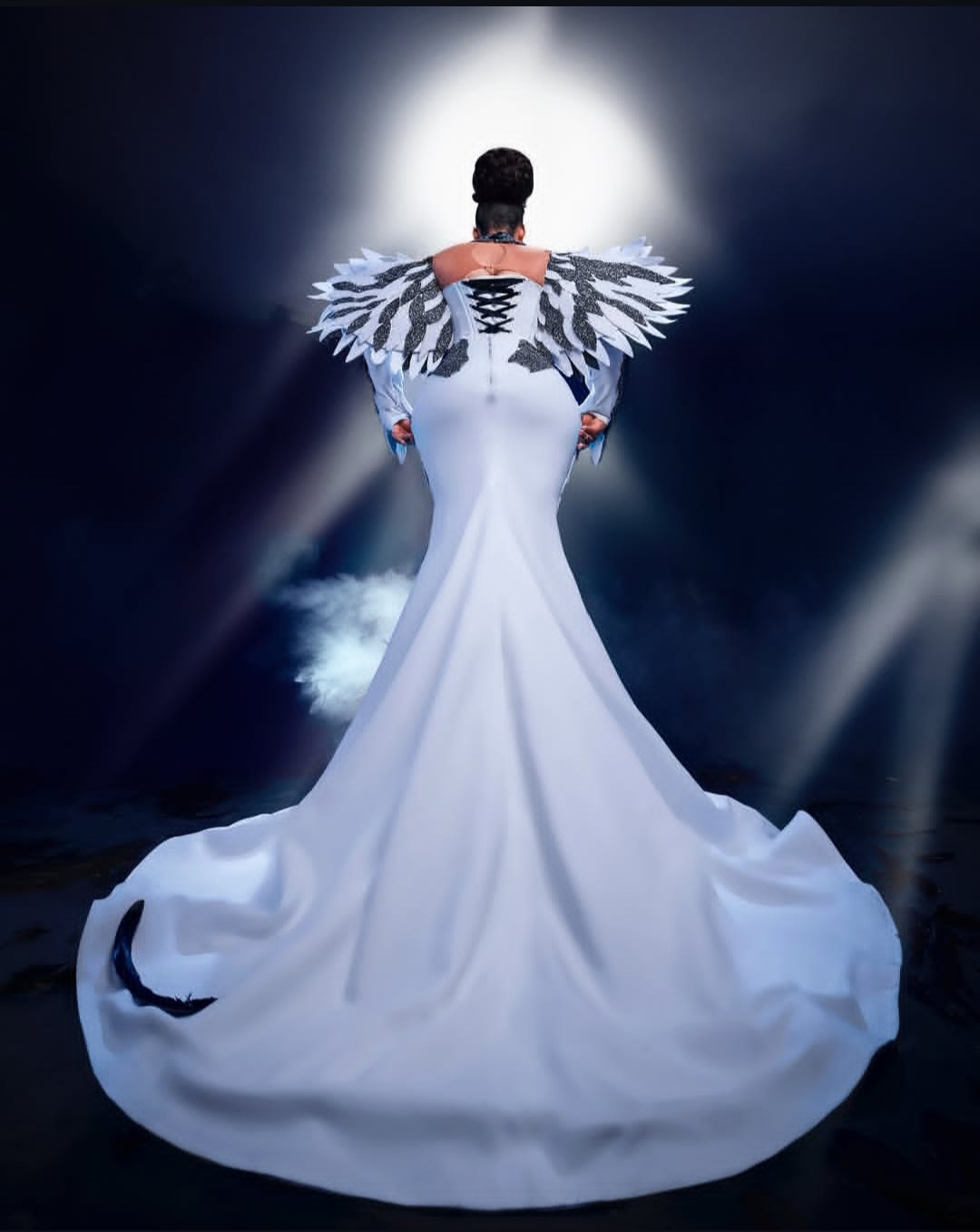 white eagle-inspired dress designed by Tiannah’s Place Empire for influencer Kentazz1
