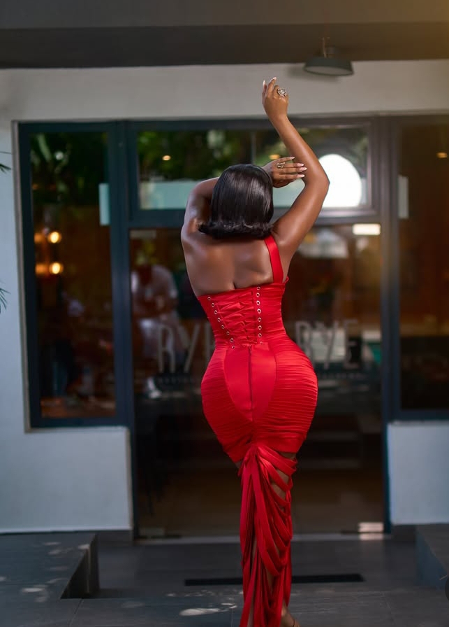 Back view of Omawumi Dada's red dress
