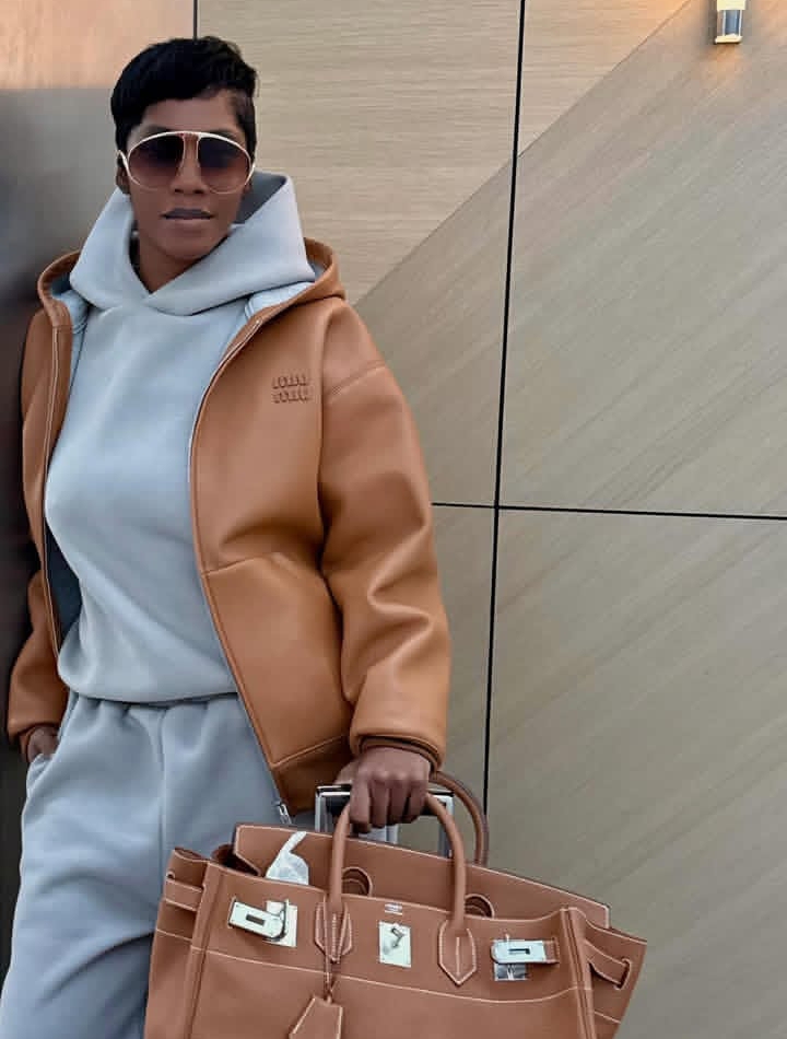 Tiwa Savage in her extraordinary airport fits