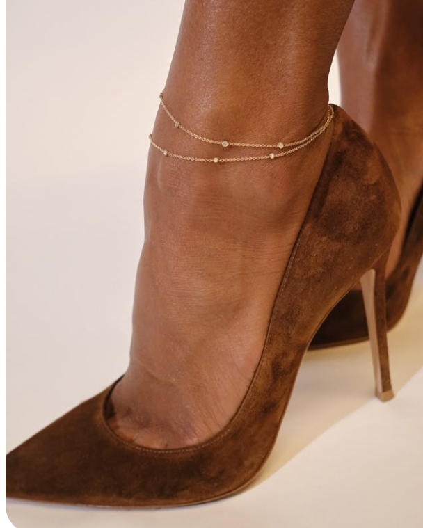Anklets on a brown stiletto