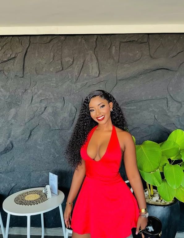 Esther Morgan in her Red mini dress