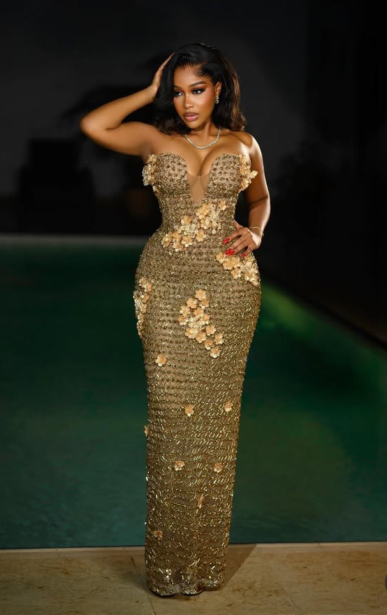 Uche Montana in her metallic gold-coloured